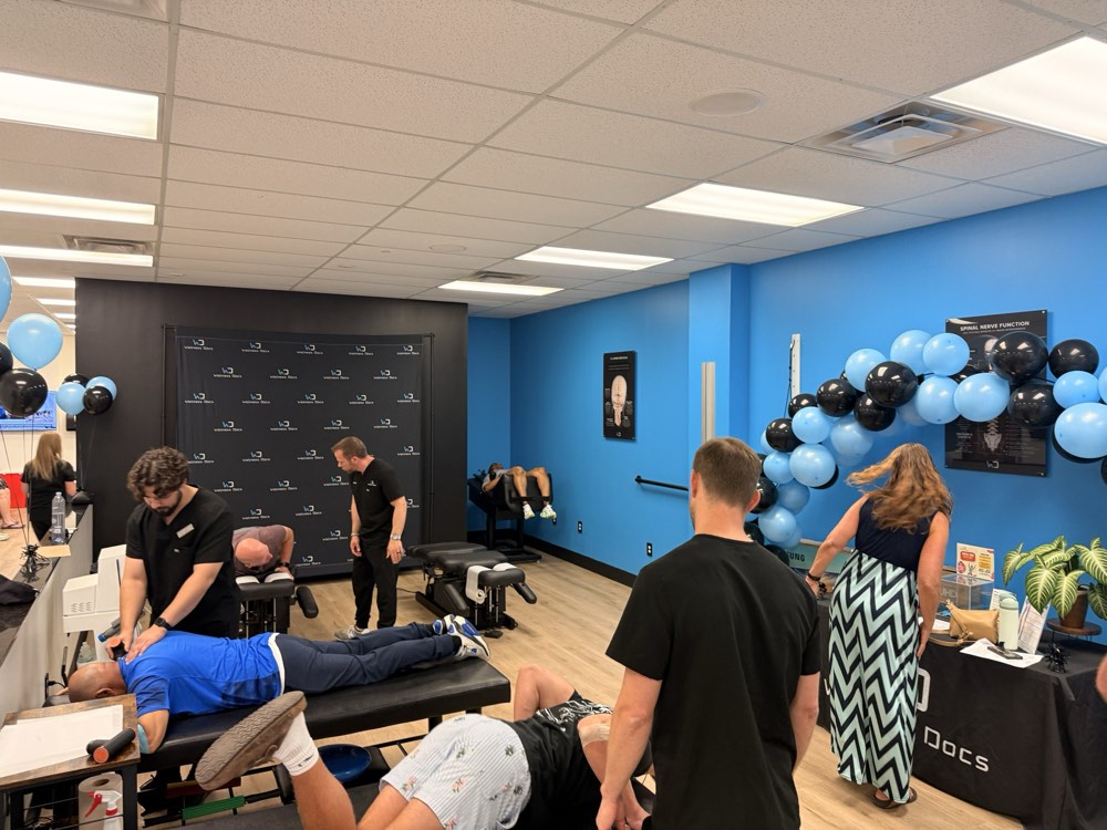 A guest getting a free massage at a Wellness Docs event