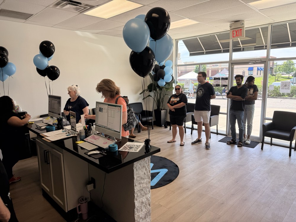 Guests lining up at the front desk to check in