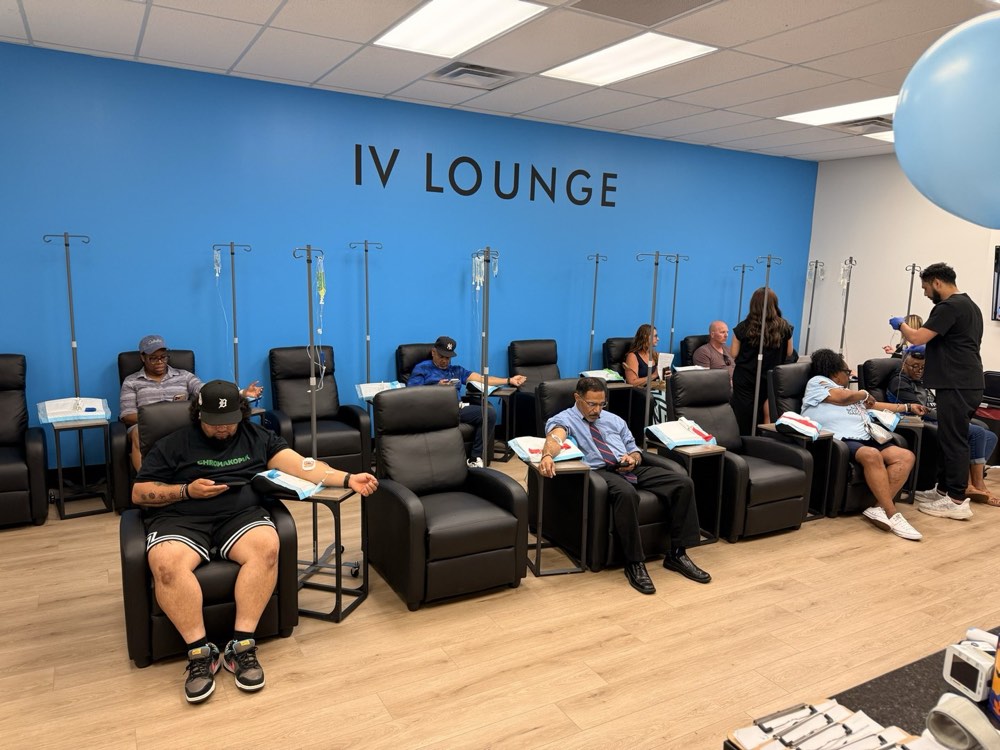 Guests receiving free vitamin IVs in the IV Lounge