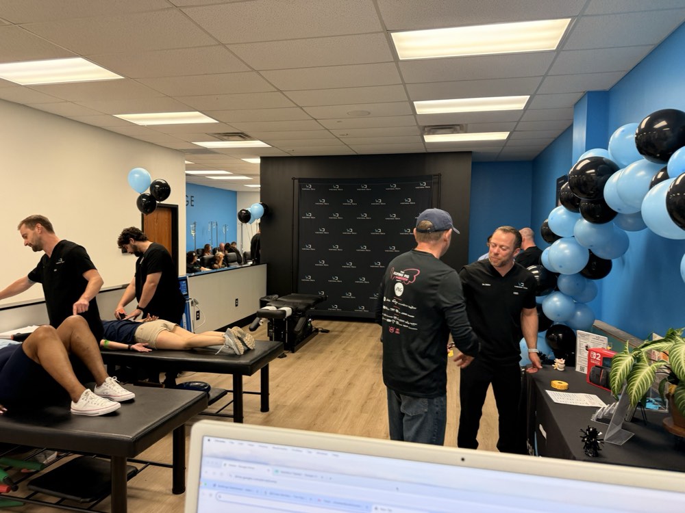 A Wellness Docs provider giving a guest a free wellness evaluation